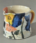 Hand mit Iris und Rosen - Krug 15,5 cm hoch - 2011